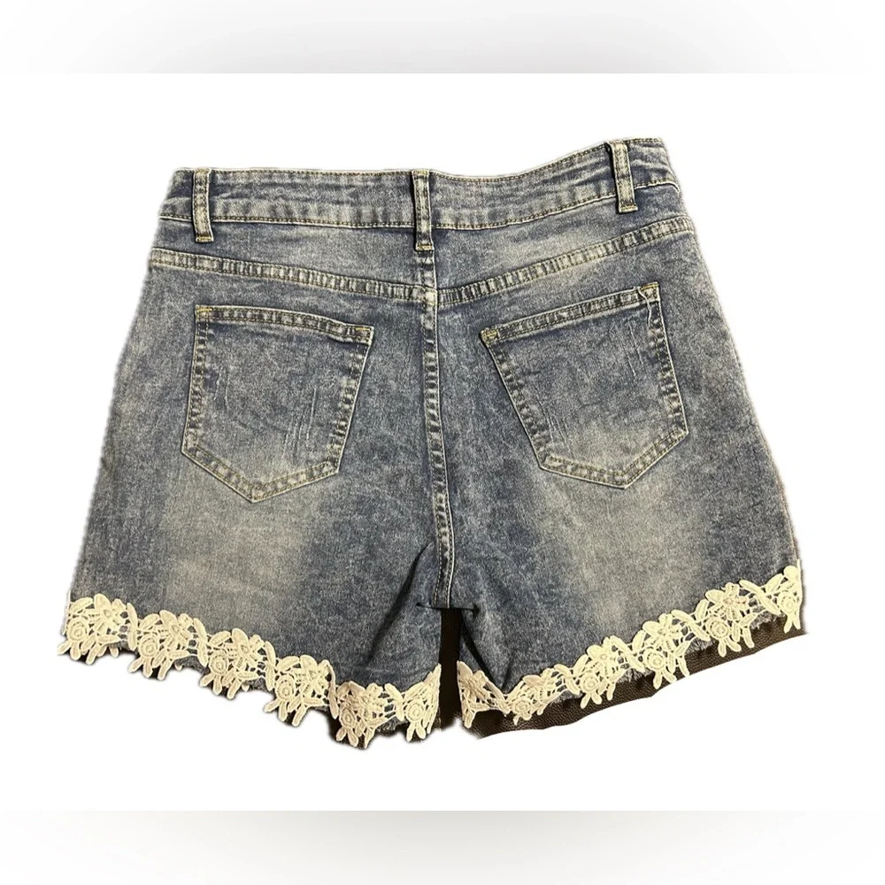 NWOT Denim Shorts with Lace Hem.